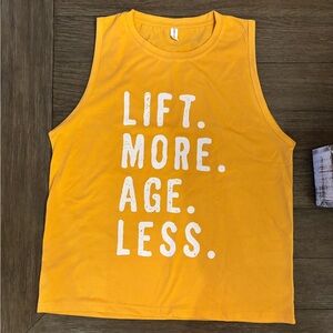 Women’s large tank top. (Runs large, fits like an XL) NEW. Lift more, age less